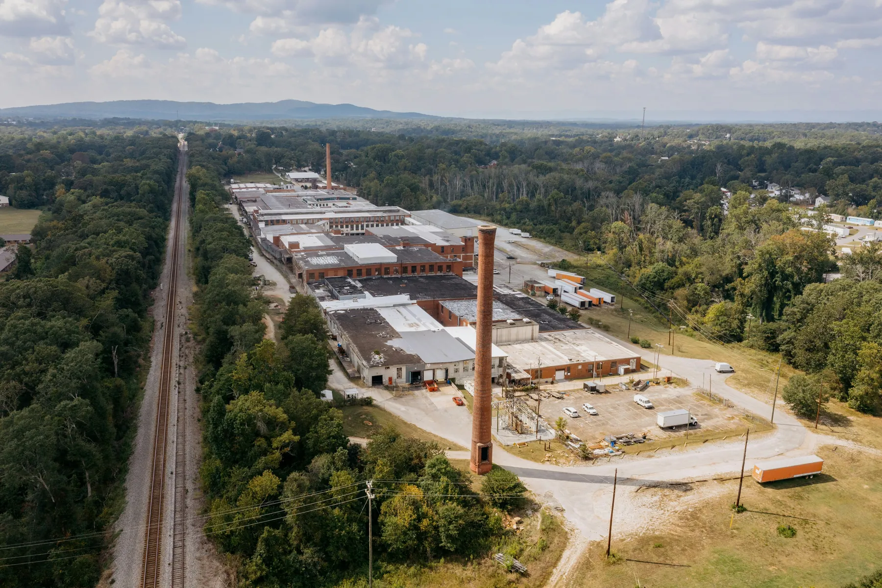 Aerial view of an industrial manufacturing facility, pharmaceutical supply chain nature risk